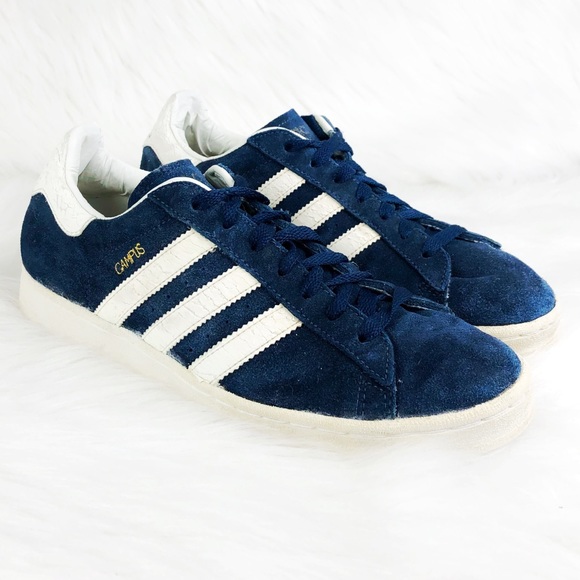 adidas blue shoes with white stripes